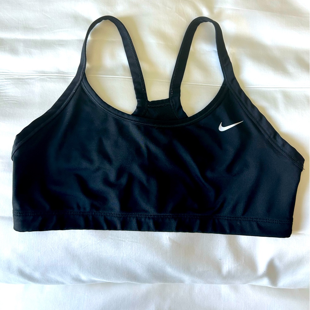 Nike sports bra. Black. Size large. Nike logo detail on back.